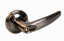 Manija tubular recta función baño, latón antiguo, llave estándar, blíster Lock